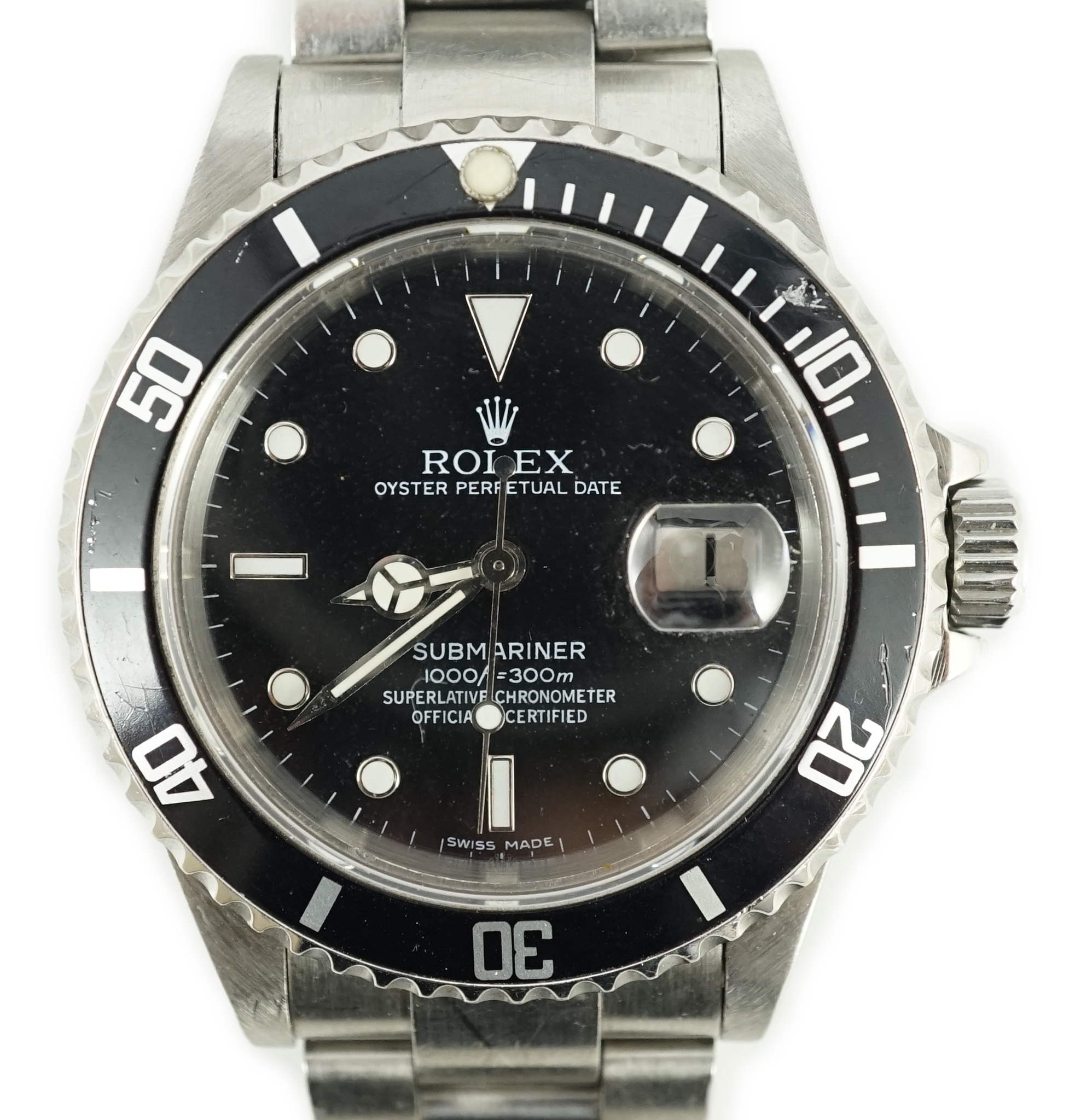 A gentleman's mid 1980's stainless steel Rolex Submariner Oyster Perpetual Date wrist watch, on a stainless steel Rolex bracelet